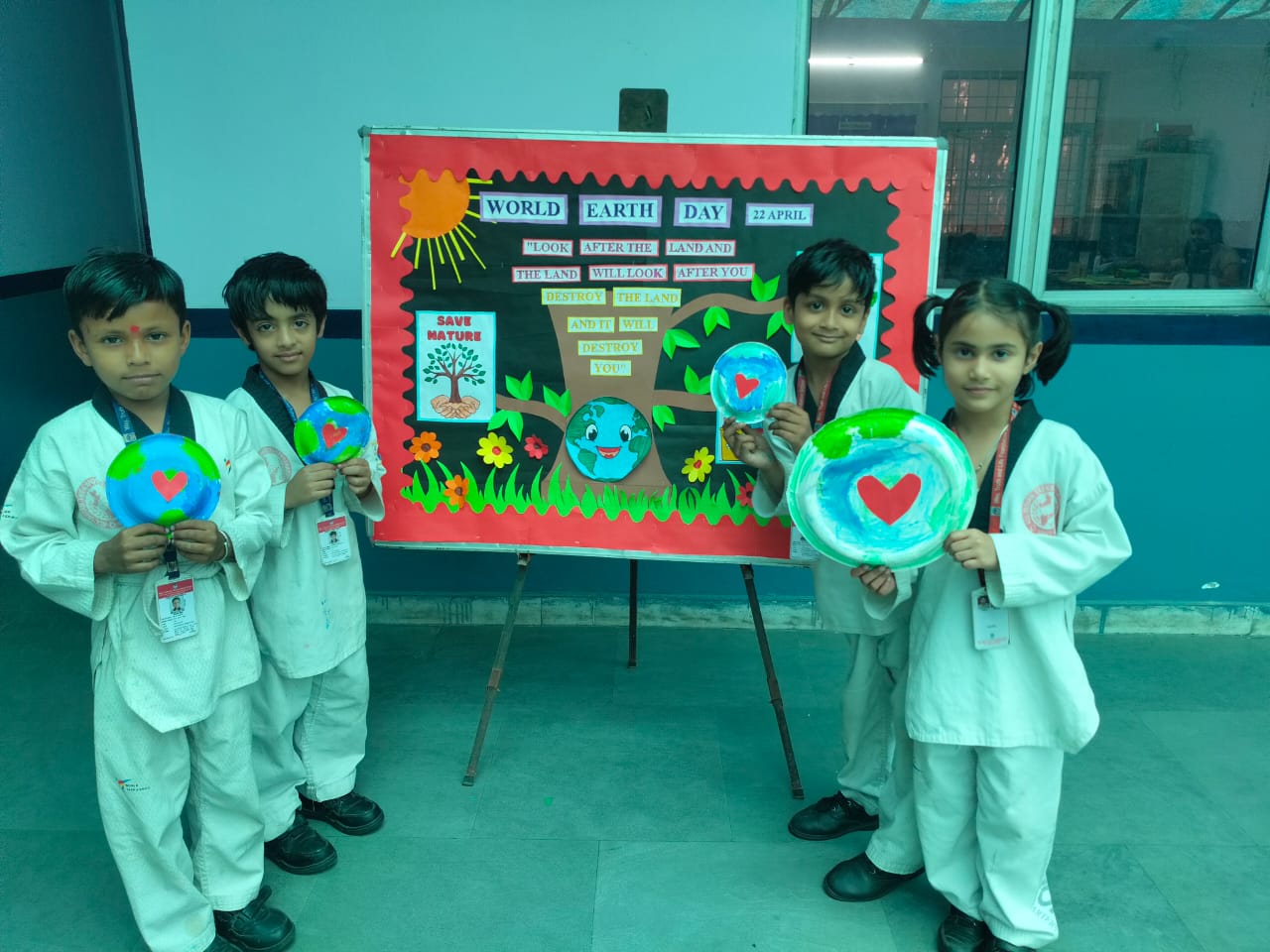 Class I teacher guiding young learners